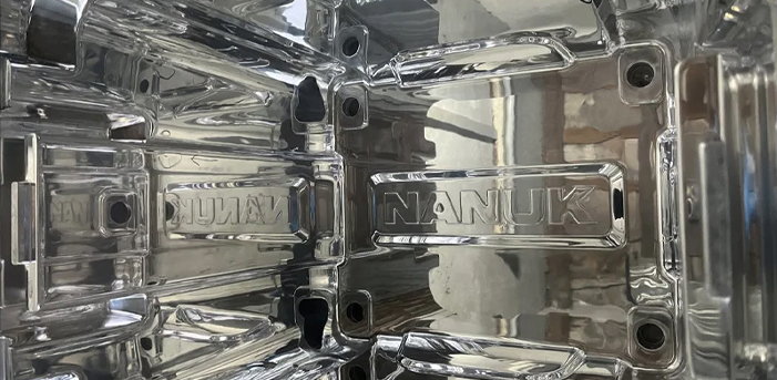 Chemical texturing and media blasting for rotational molding molds